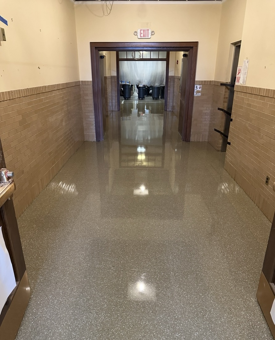 Polished terrazzo hallway in a school building